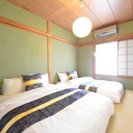 Private Room Rosso Osaka Buitenkant foto
